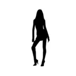 Vector image of black silhouette of a young girl in a miniskirt