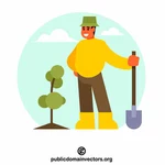 Gardener planting a tree