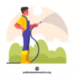 Gardener watering with a hose