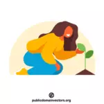 Dívka pečující o rostlinu
