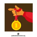 Hand holding a golden medal