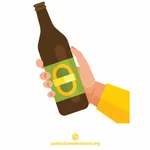 Hand holds beer bottle