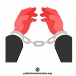 Les mains dans les chaînes du prisonnier