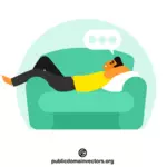 Ленивый парень лежит на диване