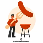 Man is grilling a sausage
