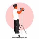 Photographer setting a camera