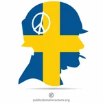 Voják míru se švédskou vlajkou