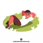 נער שוכב על הדשא