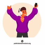 Young man listening to music on a smartphone