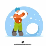 Tânăr care face un om de zăpadă